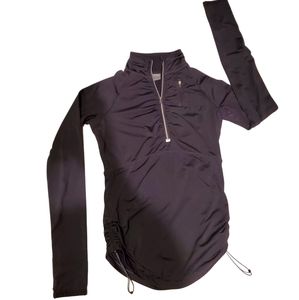 Athleta half zip top. Black with stripe features.